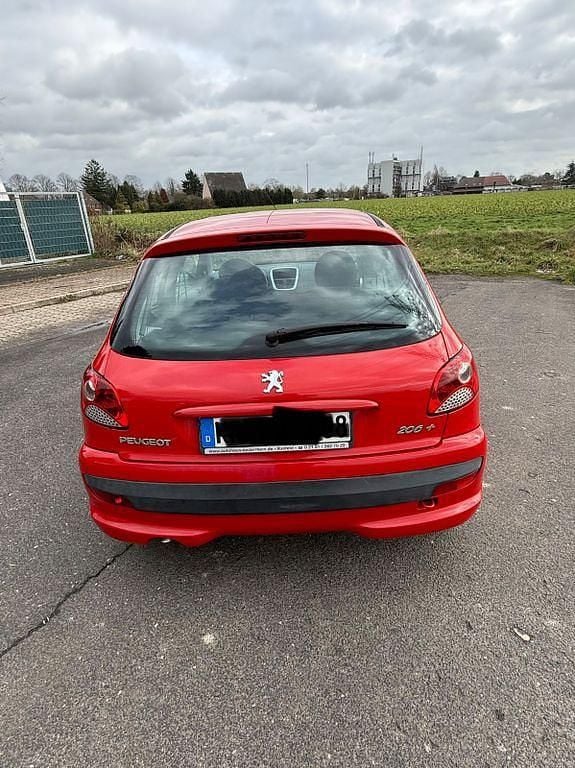 Gebraucht Peugeot 206+ 68 PS (50 kW) 2010 Rot Kleinwagen