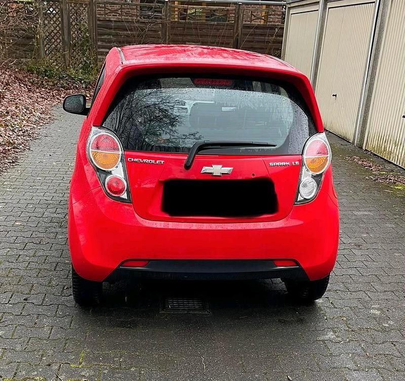 Gebraucht Chevrolet Spark 68 PS (50 kW) 2012 Rot Kleinwagen