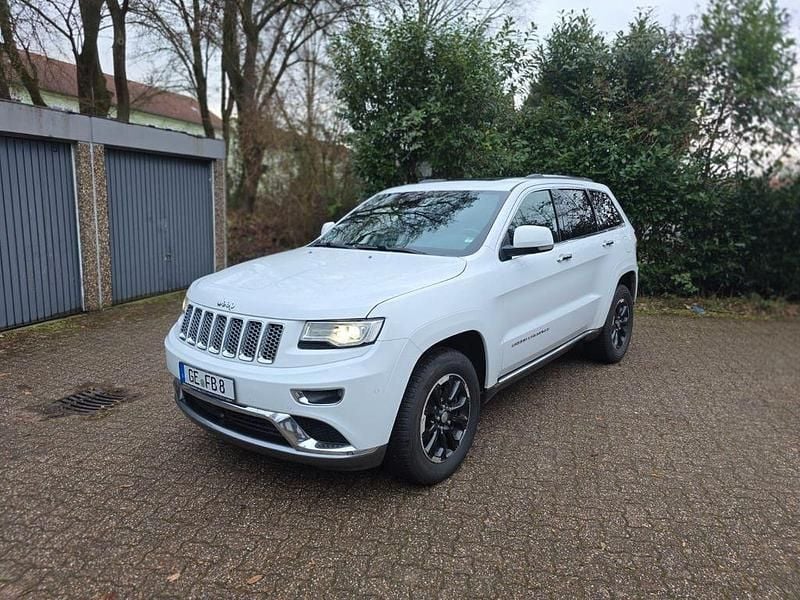 Weiß Gebraucht 2016 Jeep Grand Cherokee Summit SUV | 19.500 € (Fairer Preis) - Bild 1/4