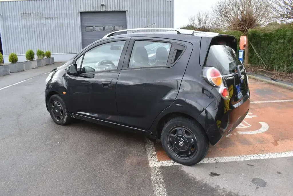 Second-hand Chevrolet Spark LS 82 CP (60 kW) 2011 Negru Hatchback