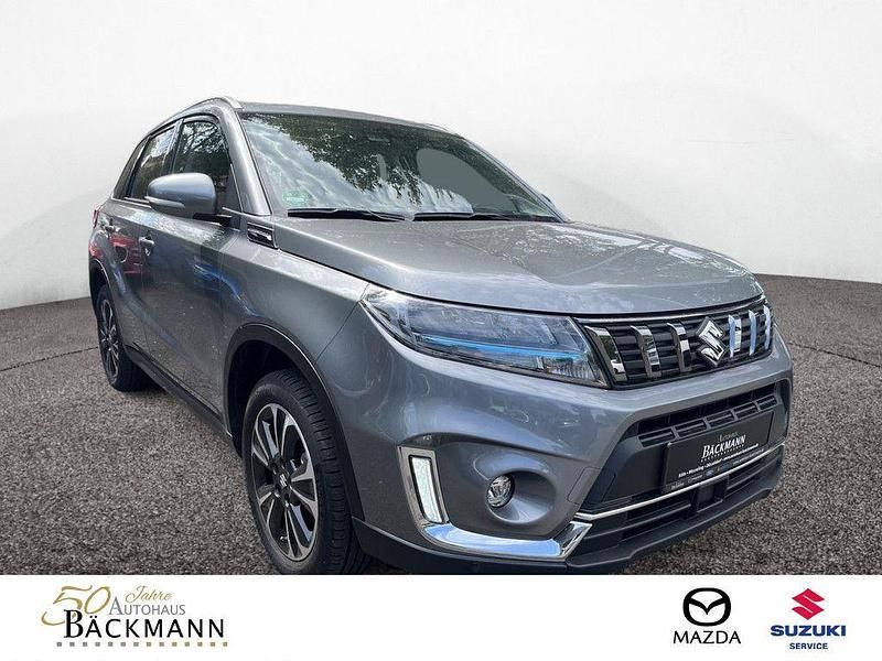Grau Gebraucht 2022 Suzuki Vitara Comfort+ SUV | 22.950 € (Fairer Preis) - Bild 1/3