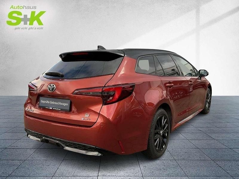 Gebraucht Toyota Corolla Basis 196 PS (144 kW) 2025 Metal oxide orange / black Kombi