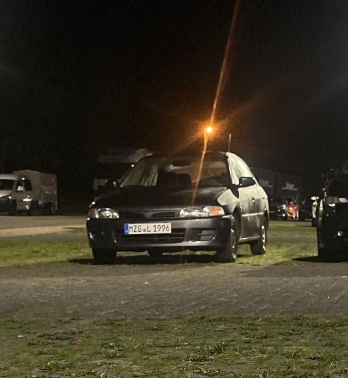 Grau Gebraucht 1996 Mitsubishi Lancer Limousine | 1.650 € (Fairer Preis) - Bild 1/4