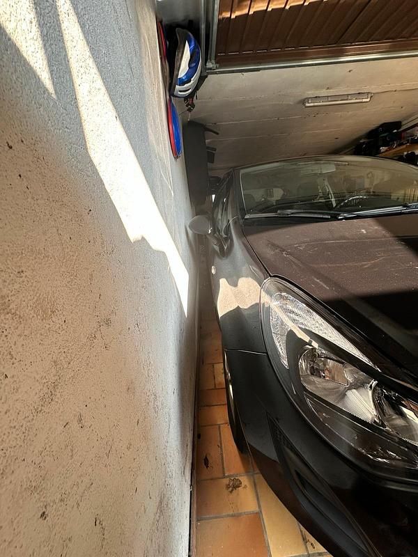 Gebraucht Opel Corsa 69 PS (50 kW) 2013 Schwarz Kleinwagen