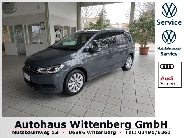 Grau Gebraucht 2024 VW Touran Move Van / Kleinbus | 38.989 € (Etwas zu teuer) - Bild 1/4