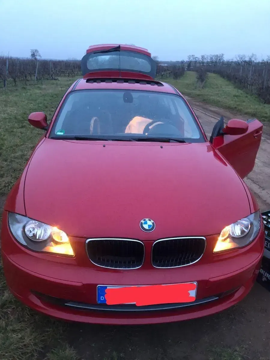Używany BMW 116 122 KM (89 kW) 2011 Czerwony Hatchback