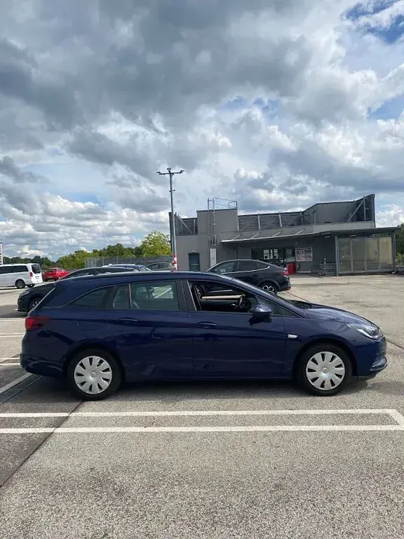 Gebraucht Opel Astra Business 110 PS (80 kW) 2016 Blau Kombi