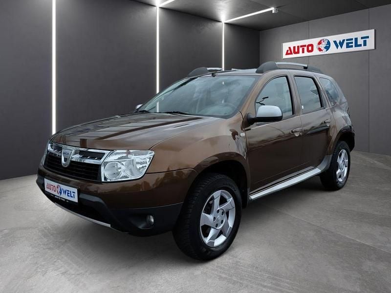Braun Gebraucht 2011 Dacia Duster Prestige SUV | 6.190 € (Fairer Preis) - Bild 1/4