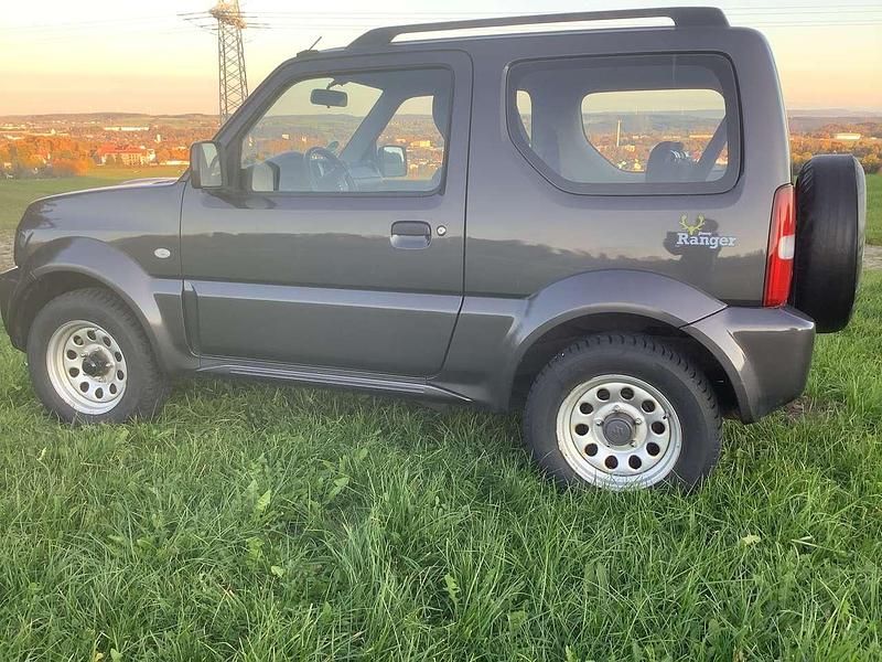 Grau Gebraucht 2014 Suzuki Jimny Ranger SUV | 14.900 € (Fairer Preis) - Bild 1/4