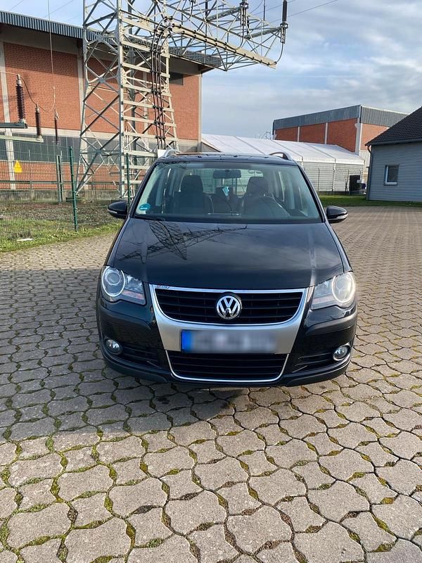 Gebraucht VW Touran Cross 105 PS (77 kW) 2010 Schwarz Van / Kleinbus