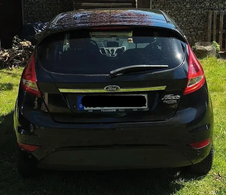 Gebraucht Ford Fiesta Titanium 70 PS (51 kW) 2011 Schwarz Kleinwagen