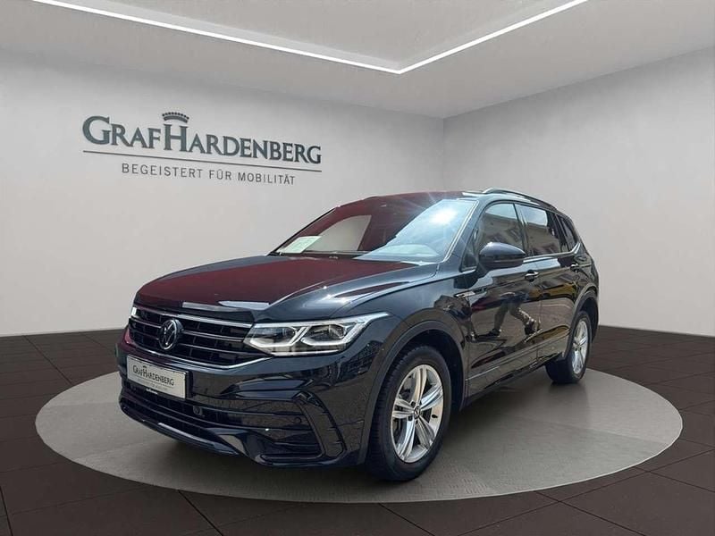 Schwarz Gebraucht 2024 VW Tiguan Allspace R-line SUV | 41.888 € (Fairer Preis) - Bild 1/4