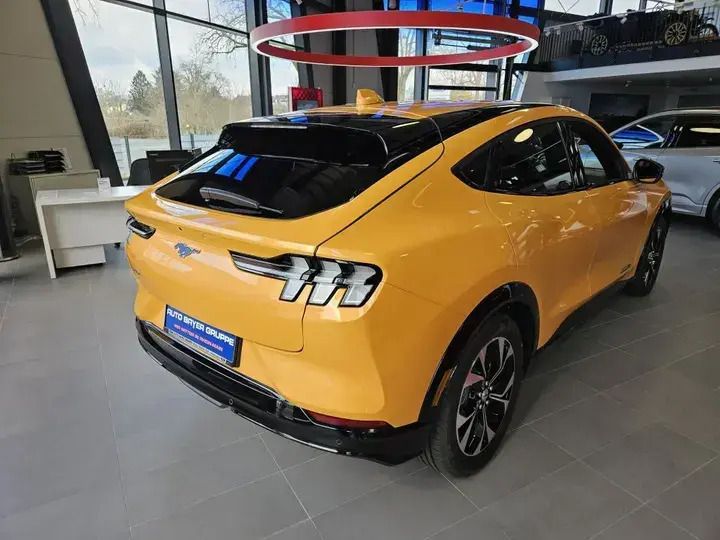 Gebraucht Ford Mustang Mach-E 258 kW (351 PS) 2024 Cyber orange metallic SUV