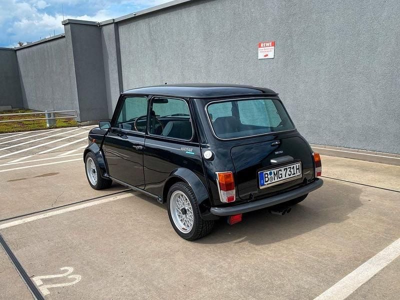 Second-hand Mini 1000 41 CP (30 kW) 1990 Negru Hatchback