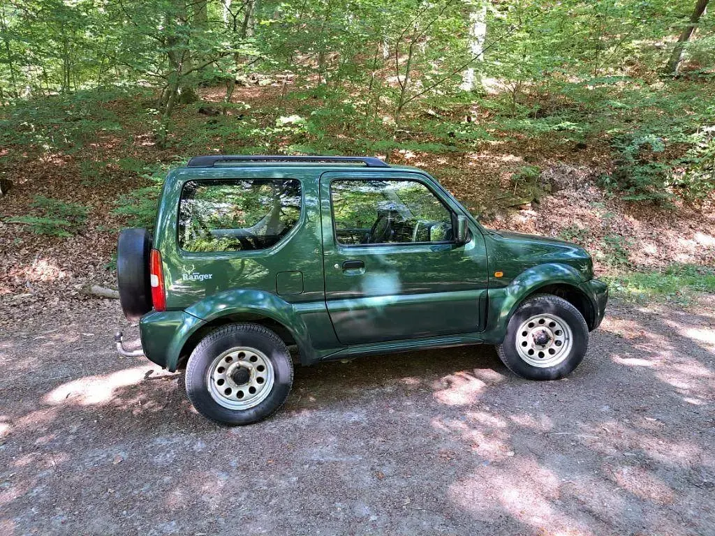 Gebraucht Suzuki Jimny 85 PS (62 kW) 2011 Grün SUV