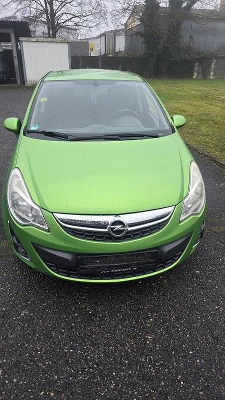 Grün Gebraucht 2012 Opel Corsa Satellite Kleinwagen | 1.000 € (Superpreis) - Bild 1/4