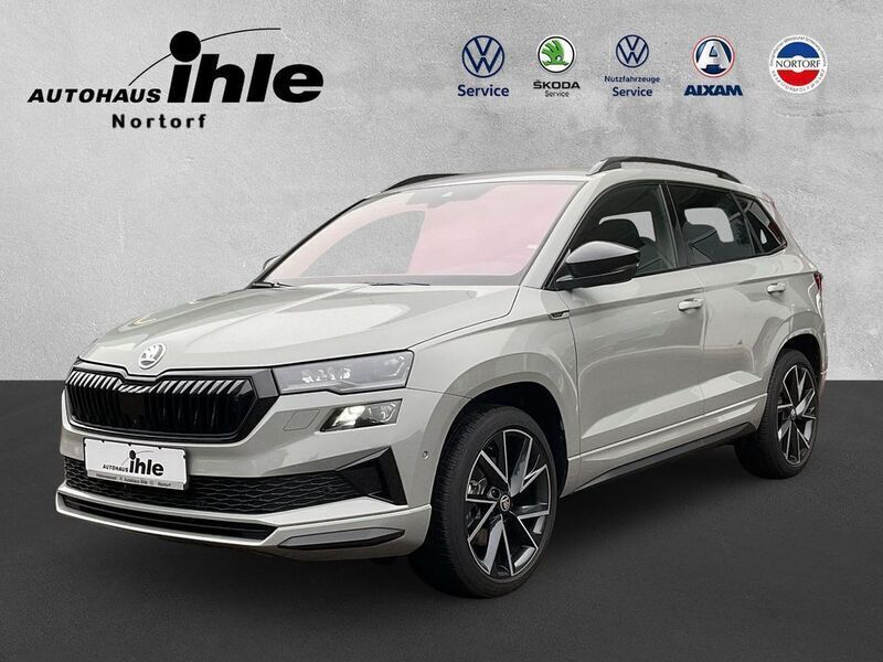 Grau Gebraucht 2023 Skoda Karoq SportLine SUV | 43.880 € - Bild 1/4