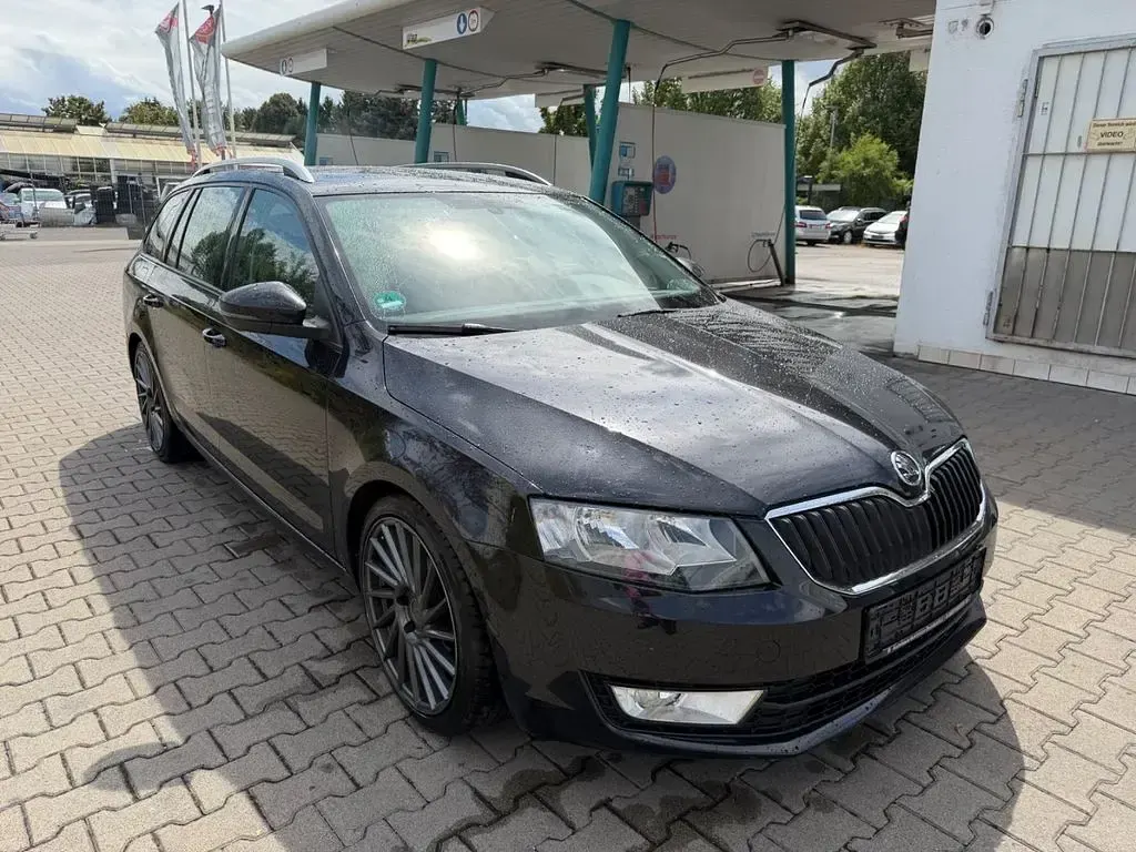Gebraucht Skoda Octavia Ambition 105 PS (77 kW) 2014 Schwarz Kombi