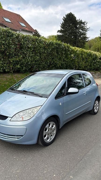 Second-hand Mitsubishi Colt Invite 95 CP (69 kW) 2006 Albastru Berlinǎ