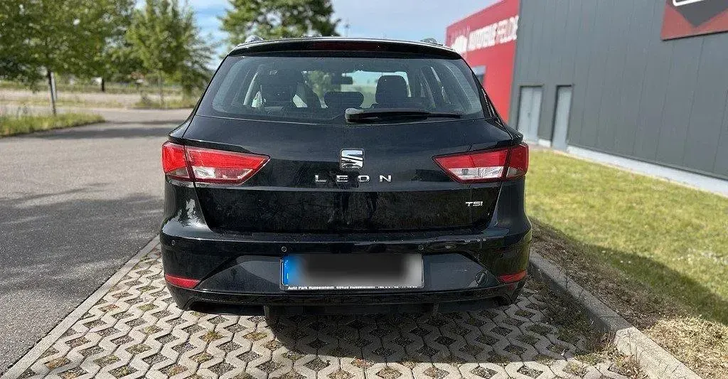 Używany Seat Leon Style 125 KM (91 kW) 2017 Czarny Kombi