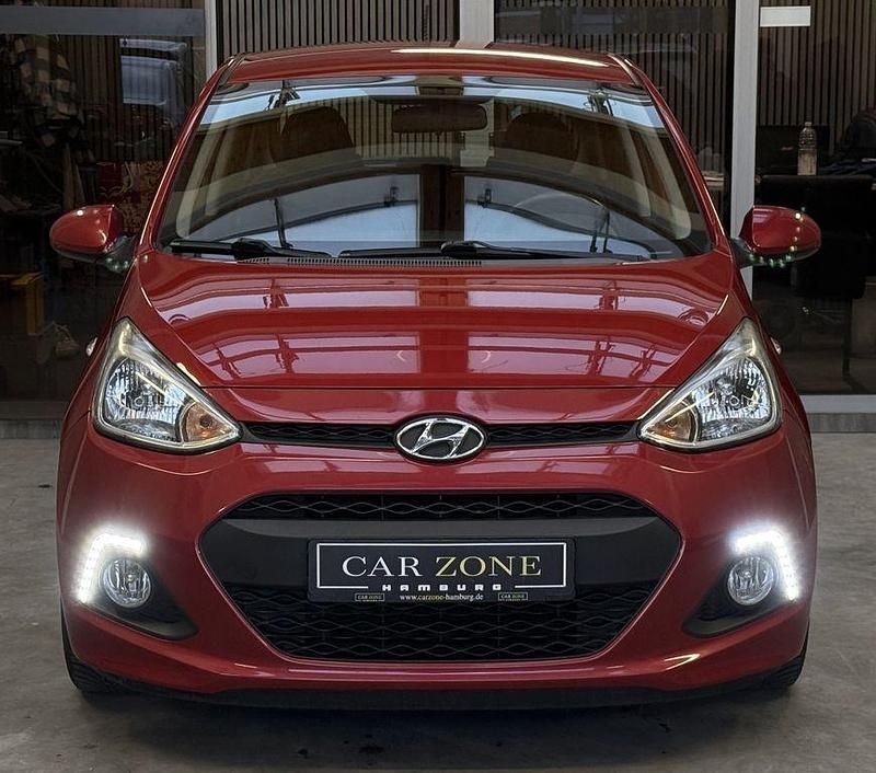 Gebraucht Hyundai i10 87 PS (63 kW) 2014 Rot Kleinwagen