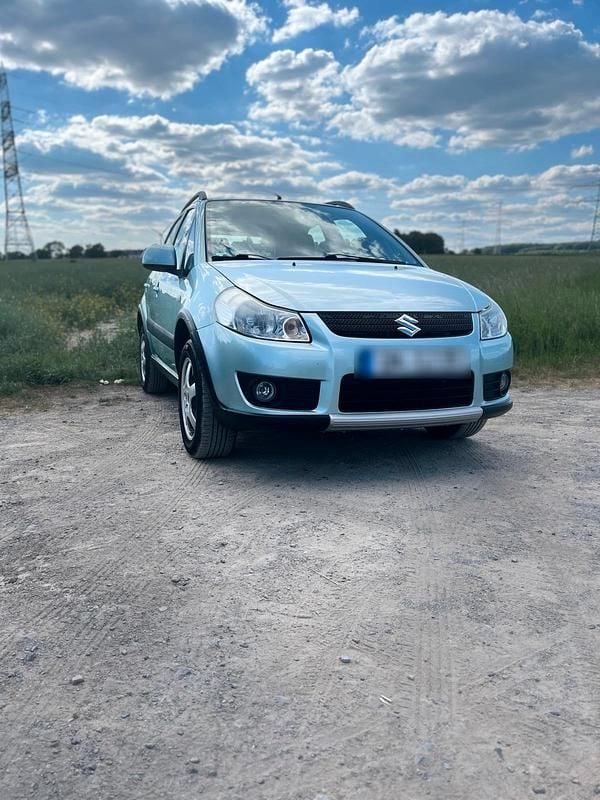 Blau Gebraucht 2006 Suzuki SX4 Limousine | 3.000 € (Superpreis) - Bild 1/4