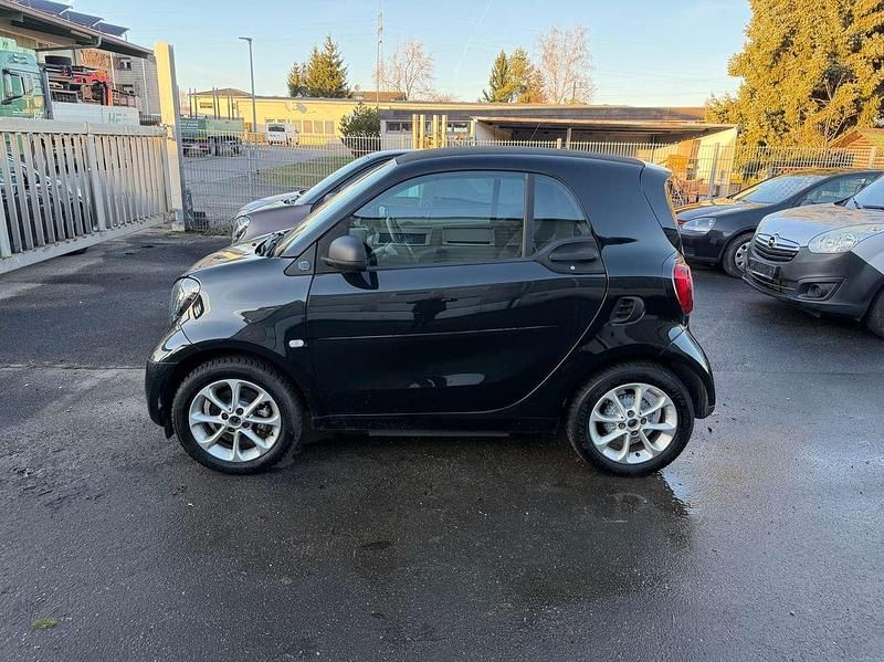 Gebraucht Smart ForTwo Coupé 60 kW (82 PS) 2022 Schwarz Kleinwagen
