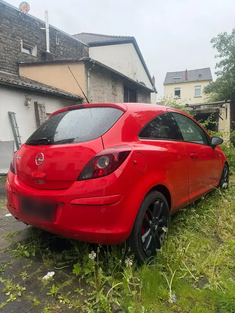 Usata Opel Corsa 101 CV (74 kW) 2011 Rosso Utilitaria