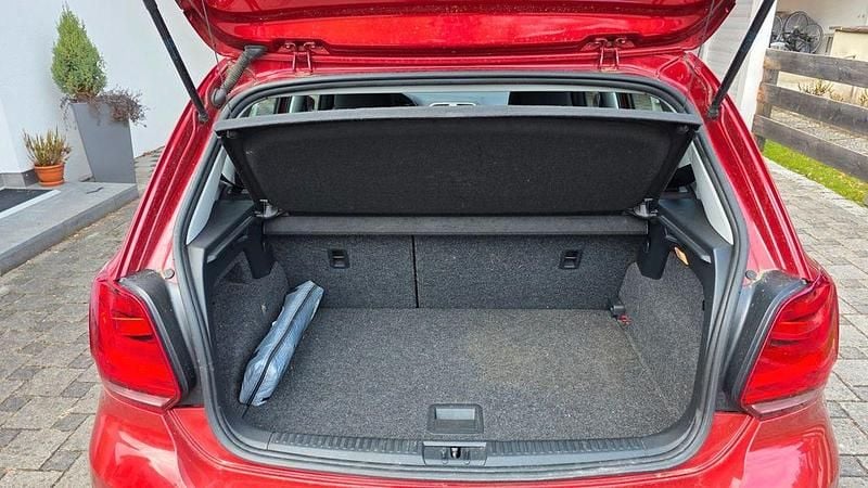 Second-hand VW Polo 110 CP (80 kW) 2016 Portocaliu Berlinǎ