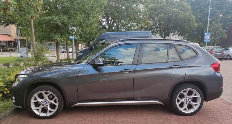 Grau Gebraucht 2014 BMW X1 xLine SUV | 12.499 € (Fairer Preis) - Bild 1/4