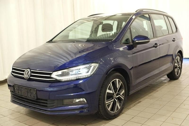 Blau Gebraucht 2024 VW Touran Comfortline Van / Kleinbus | 29.686 € (Guter Preis) - Bild 1/4