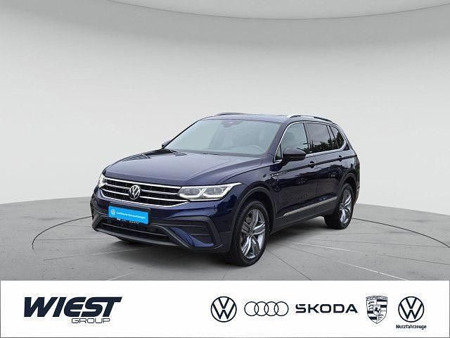 Atlantic blue metallic Gebraucht 2023 VW Tiguan Allspace Move SUV | 37.380 € (Guter Preis) - Bild 1/4