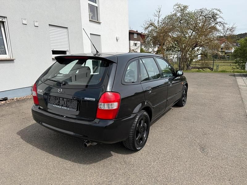 Second-hand Mazda 323F 98 CP (72 kW) 2002 Negru Berlinǎ