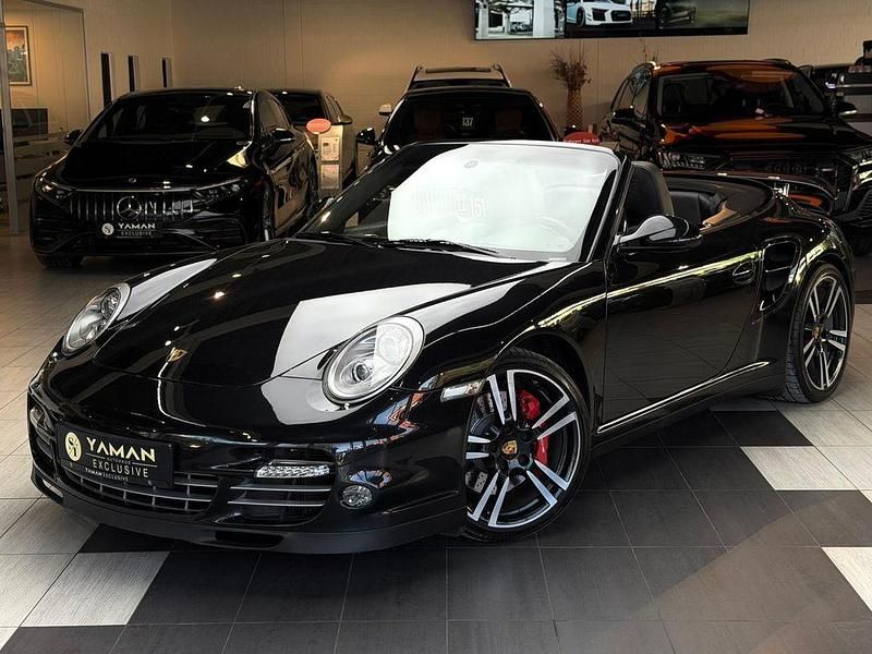 Basaltschwarzmetallic Gebraucht 2010 Porsche 911 Turbo Cabriolet Sport Cabrio | 86.850 € (Fairer Preis) - Bild 1/4