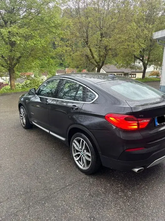 Używany BMW X4 190 KM (139 kW) 2014 Czarny SUV