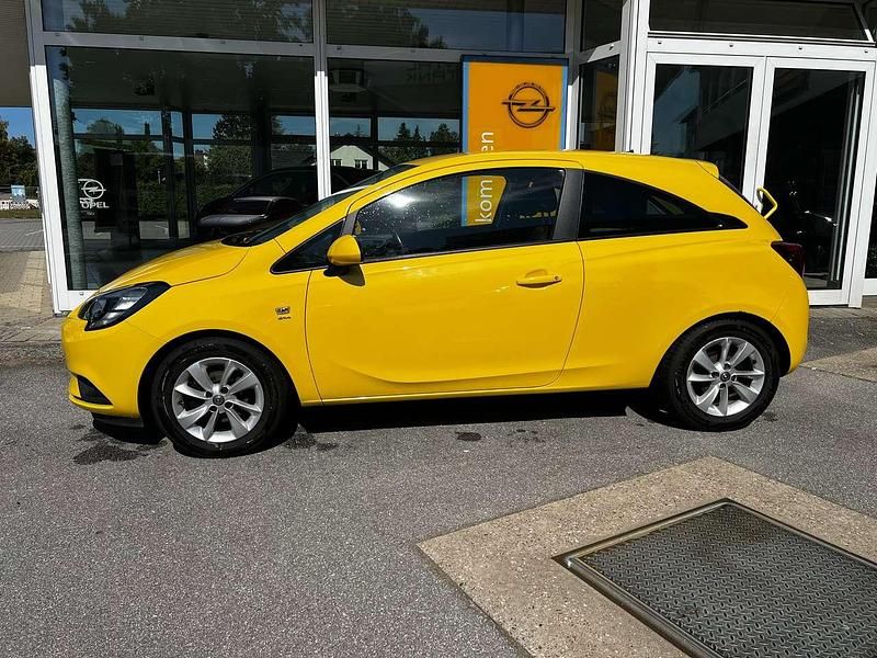 Gebraucht Opel Corsa drive 90 PS (66 kW) 2016 Sunny yellow (uni) Kleinwagen