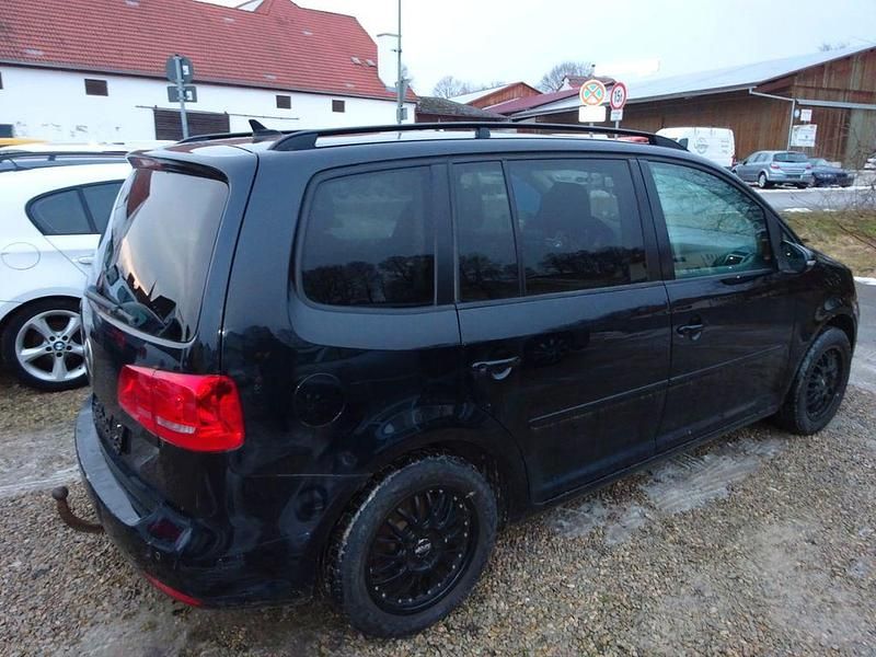 Gebraucht VW Touran 105 PS (77 kW) 2011 Schwarz Van / Kleinbus