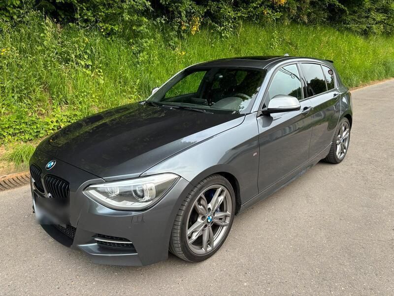 Grau Gebraucht 2014 BMW M135 Kleinwagen | 20.900 € (Teuer) - Bild 1/4