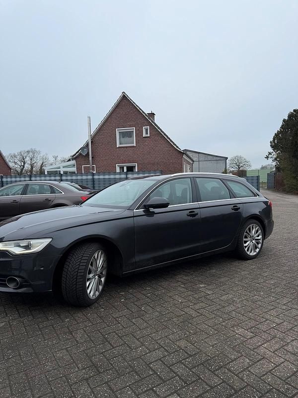 Używany Audi A6 201 KM (147 kW) 2014 Czarny Kombi
