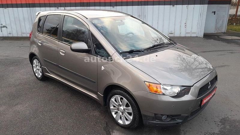 Gebraucht Mitsubishi Colt Motion 95 PS (69 kW) 2012 Braun Kleinwagen