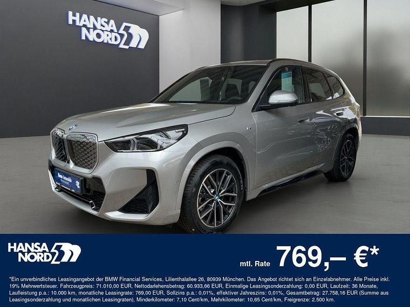 Silber Neu 2025 BMW iX1 M Sport SUV | 61.990 € (Teuer) - Bild 1/4