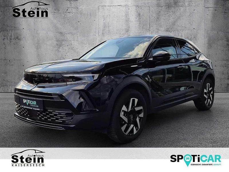 Schwarz (metallic) Gebraucht 2024 Opel Mokka SUV | 22.990 € (Fairer Preis) - Bild 1/4