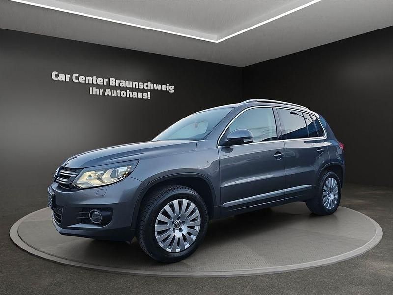 Grau Gebraucht 2012 VW Tiguan Sport SUV | 12.999 € (Etwas zu teuer) - Bild 1/4