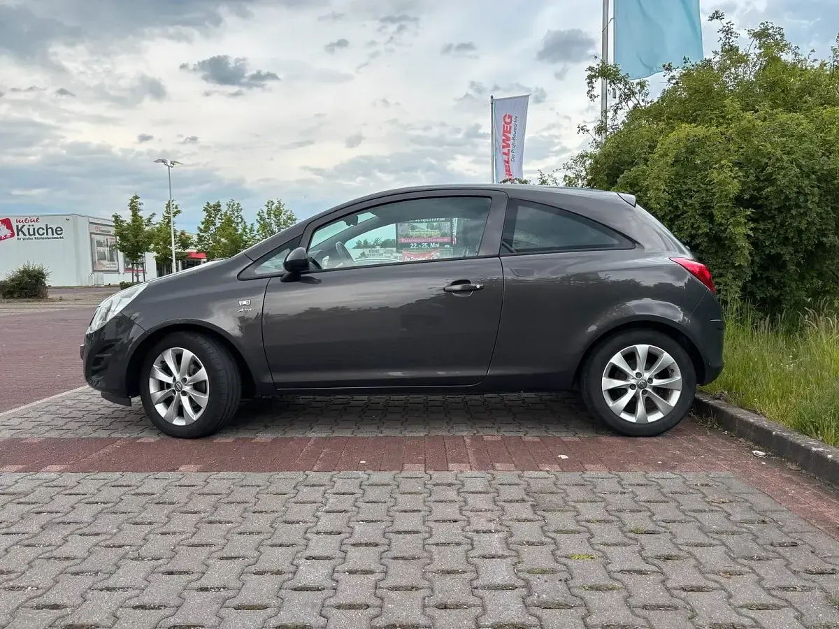 Gebraucht Opel Corsa 60 PS (44 kW) 2013 Grau Kleinwagen