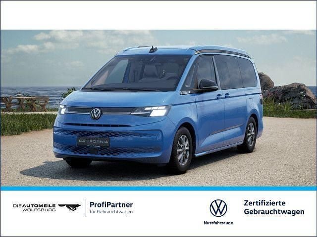 Medium blue metallic Gebraucht 2025 VW California California Van | 65.690 € (Guter Preis) - Bild 1/4