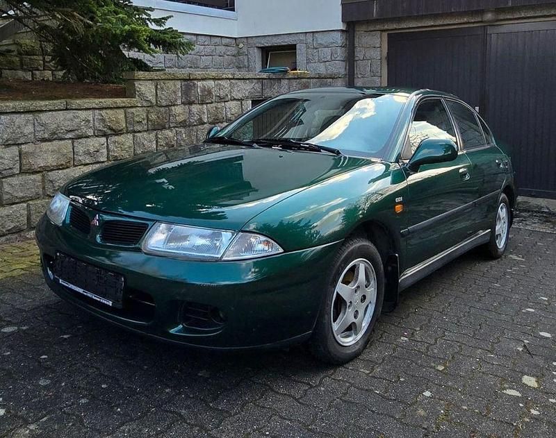 Grün Gebraucht 1998 Mitsubishi Carisma Limousine | 5.200 € - Bild 1/4