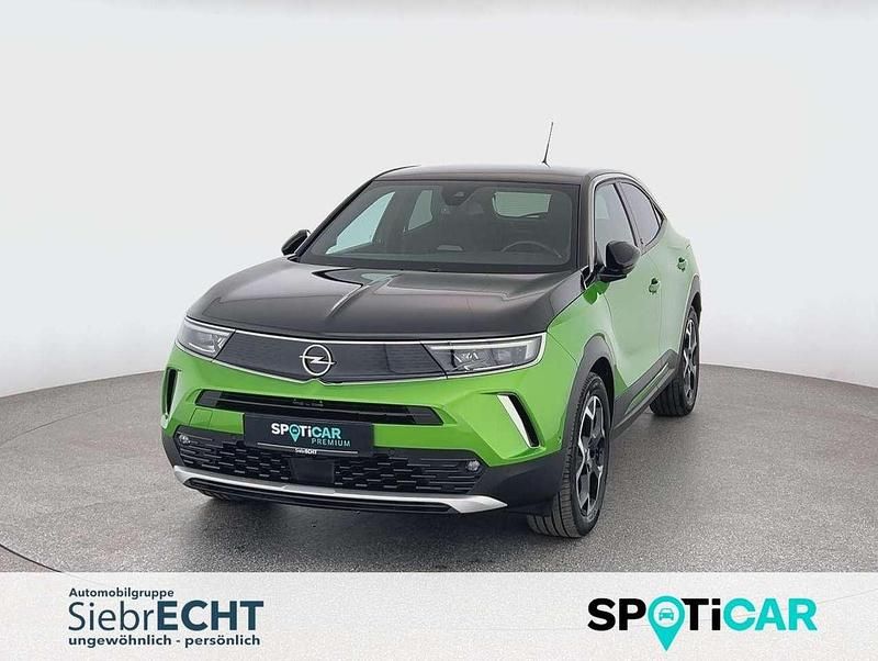 Grün Gebraucht 2021 Opel Mokka-e Ultimate SUV | 16.470 € (Fairer Preis) - Bild 1/4