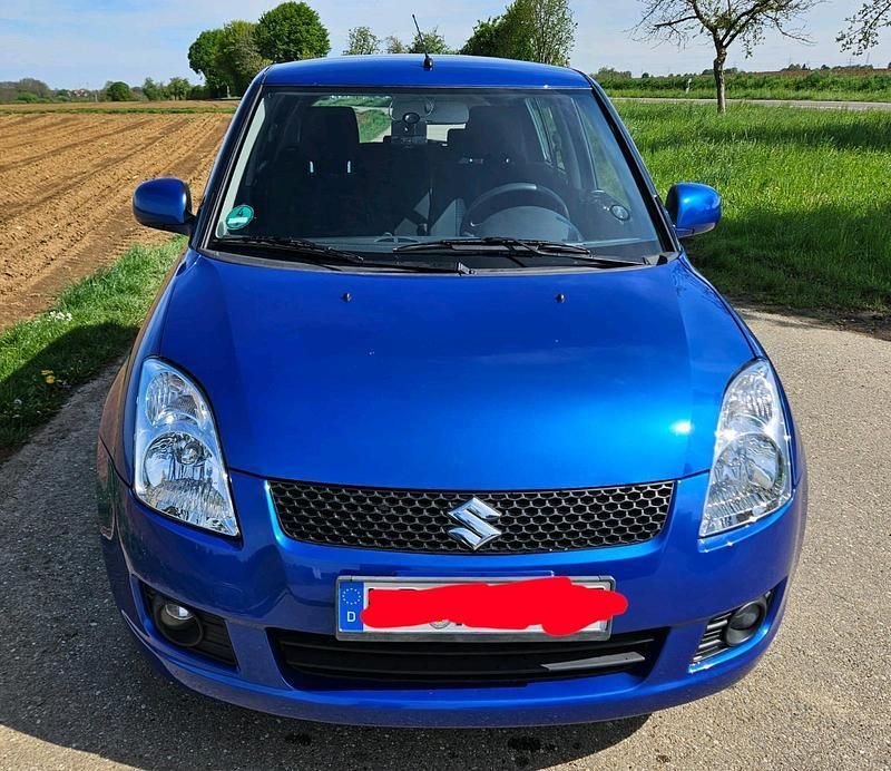 Blau Gebraucht 2009 Suzuki Swift Kleinwagen | 6.850 € - Bild 1/4