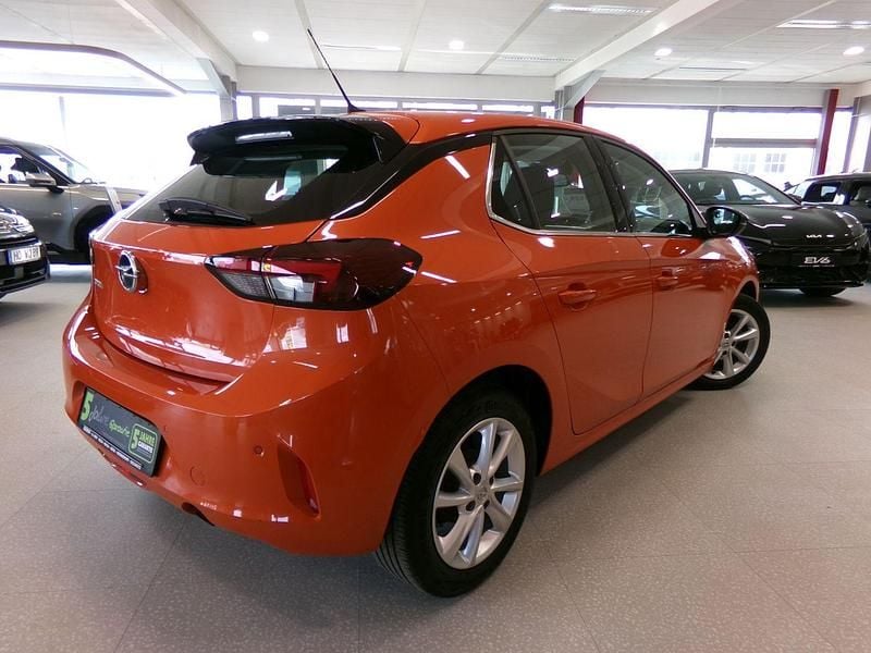 Gebraucht Opel Corsa Elegance 101 PS (74 kW) 2023 Power orange/spiegel schwarz lackie Kleinwagen