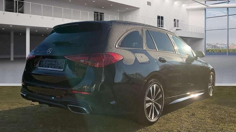 Gebraucht Mercedes C300e AMG 313 PS (230 kW) 2022 Obsidianschwarz (metallic) Kombi